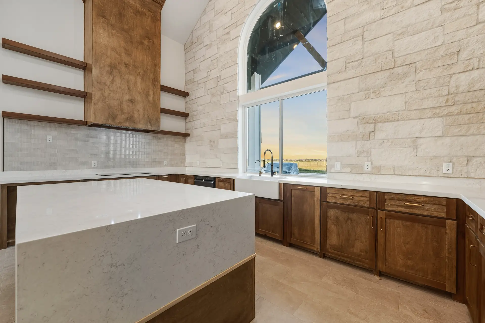 Kitchen of the Modern Farmhouse in La Feria, TX — custom home built by Go To Guys RGV